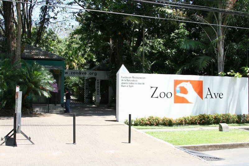 Zoo Ave entrance with sign and greenery