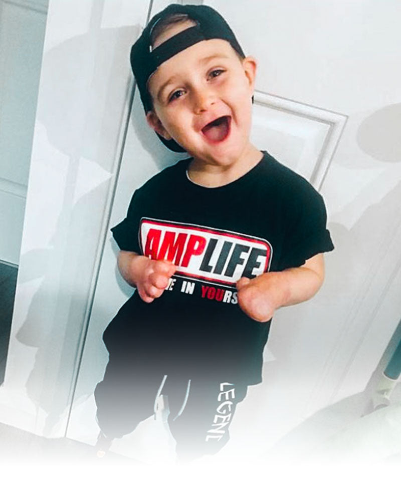 AMPLIFE SUPPORTER WEARING KIDS AMPLIFE BELIEVE IN YOURSELF T-SHIRT