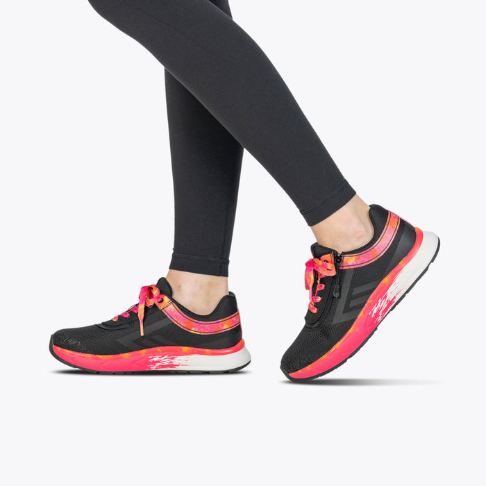 Women's Black/Fuchsia Fire BILLY Sport Inclusion on model worn with black leggings on a white background