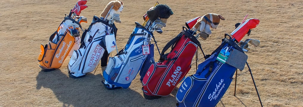 Golf bags from golfers coached by Carlos Brown.