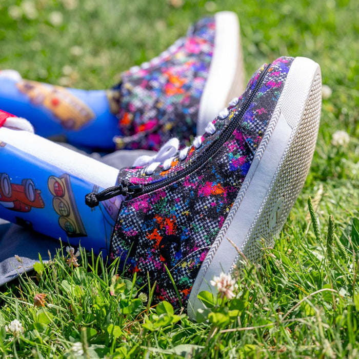 Detail of zipper on Rainbow Sk8ter BILLY Classic D|R II High on model worn a colorful AFO in the woods