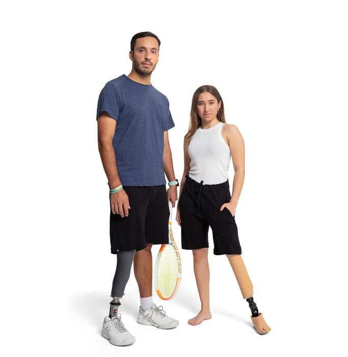 Male and female amputees wearing the MAI We Care Adaptive Shorts