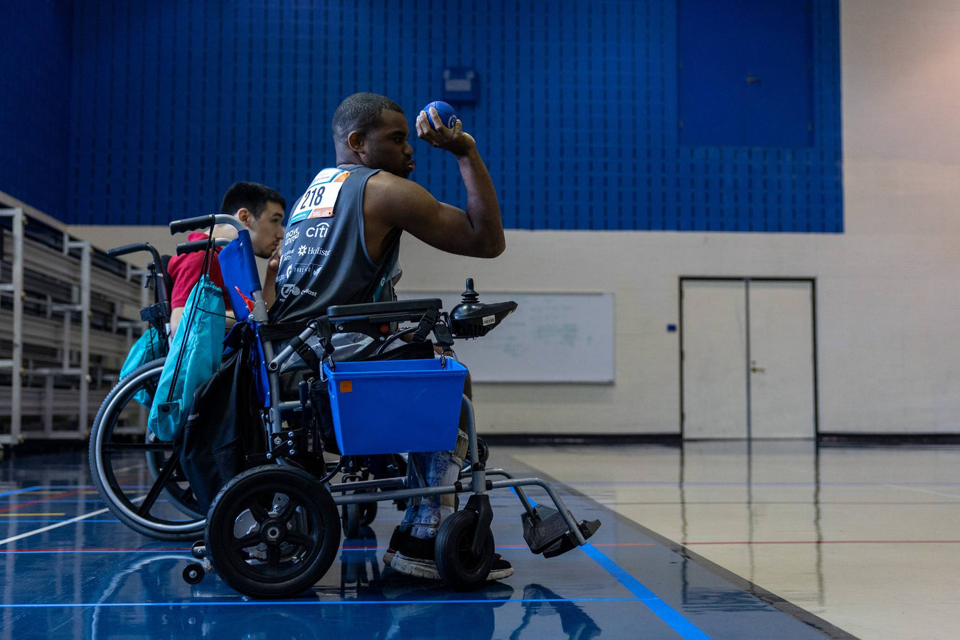 GLASA athlete getting ready to roll a boccia ball.