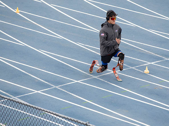 GLASA athlete lunging on a track.