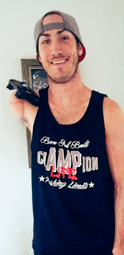 Portrait of Aaron Soetaert holding an Xbox 360 controller with his right shoulder disarticulation amputated arm while rocking his Amplife® while wearing the Born and Build chAMPion Tank Top