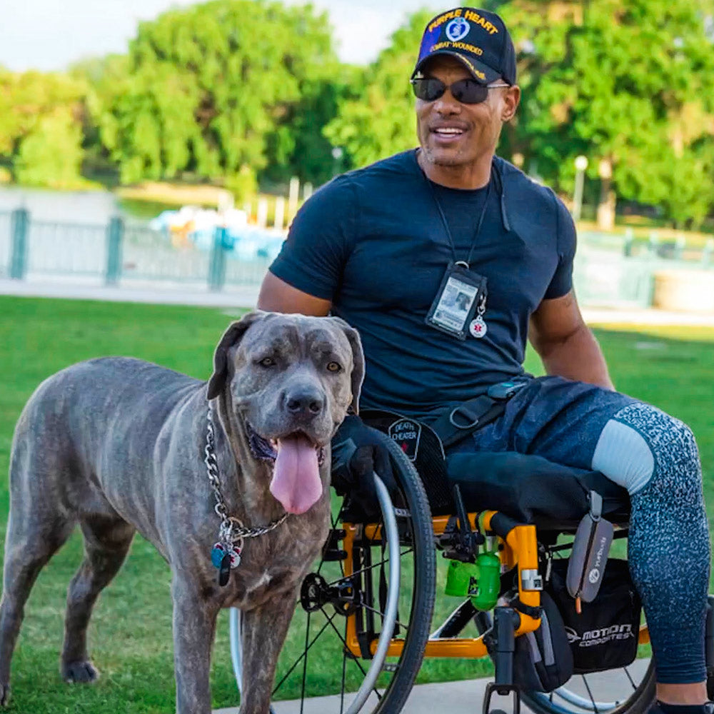 AMPLIFE SUPPORTER TONY DREES WITH DOG