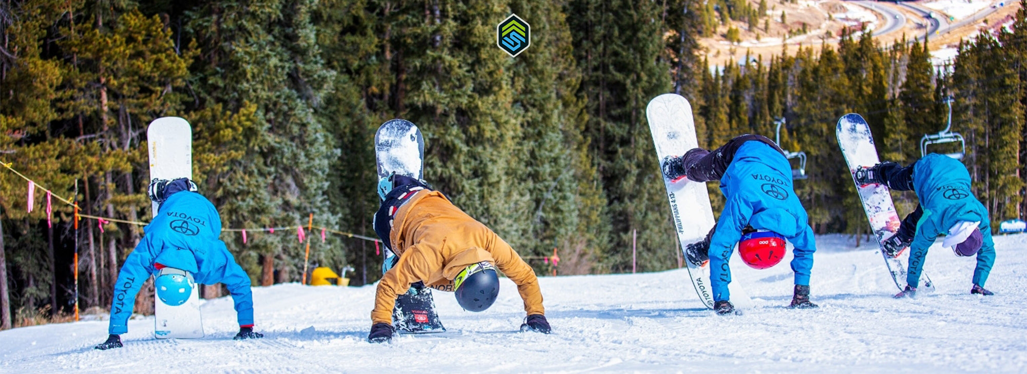 Group of Adaptive Action Sports snowboarders practicing drills on the mountain.