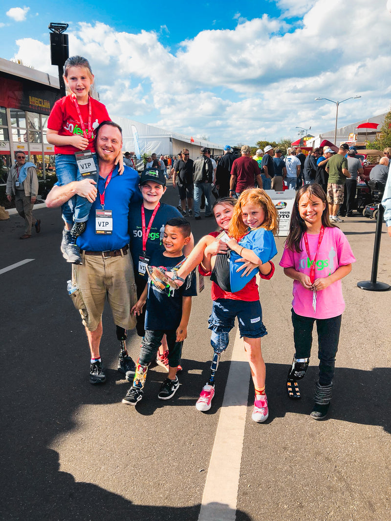 Amplife® Love Cause 50 Legs group photo of adult and kid prosthetic recipients