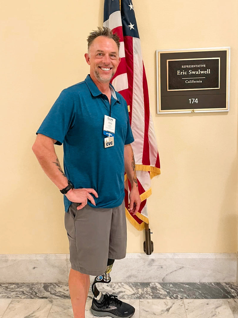 Portrait of Team Amplife® Ambassador Andrew May in the U.S. Capitol in front of Eric Swalwell's office, who his representative 