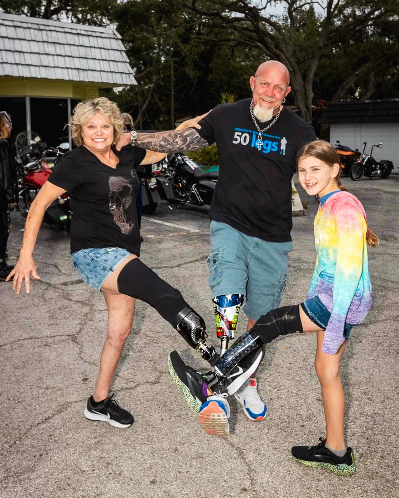 Amplife® Love Cause 50 Legs group photo of multiple amputees with 50 Legs Founder Steve Chamberland