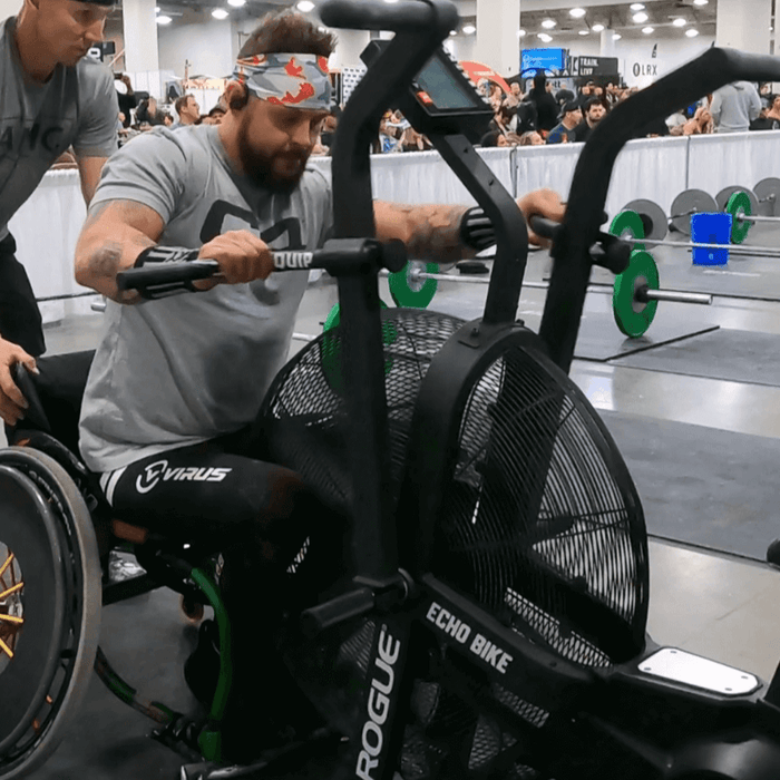 Equip Products Rogue® Echo Bike Monitor Flip Interface in use by an athlete using a wheelchair in a competition.