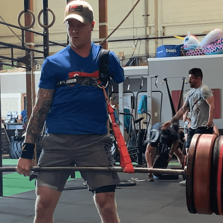 Equip Products Aldridge Arm™ Deadlift Strap in use by Logan Aldridge in the gym as he deadlifts 450lbs with a left above elbow amputation.