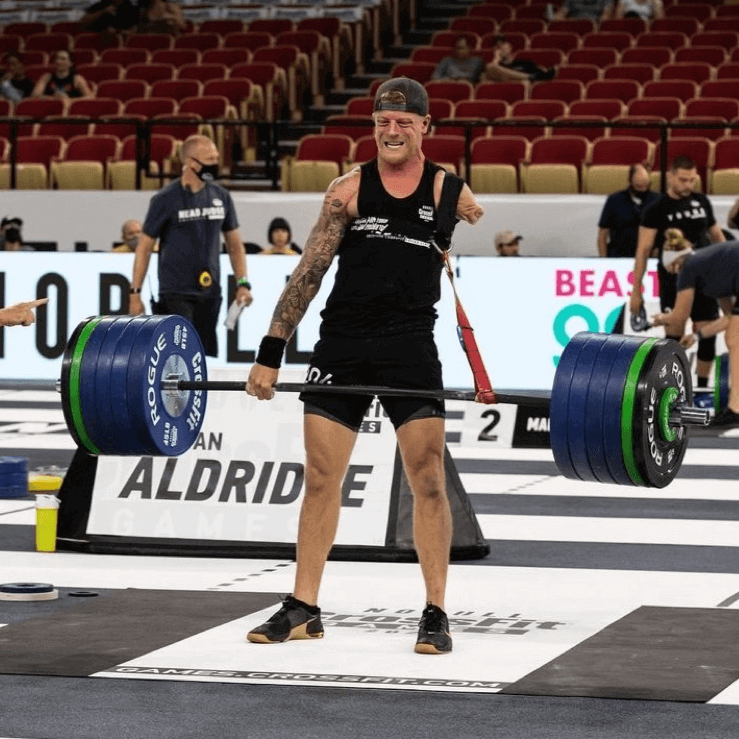 Equip Products Aldridge Arm™ Deadlift Strap in use by Logan Aldridge in a competition as he deadlifts 450lbs with a left above elbow amputation.