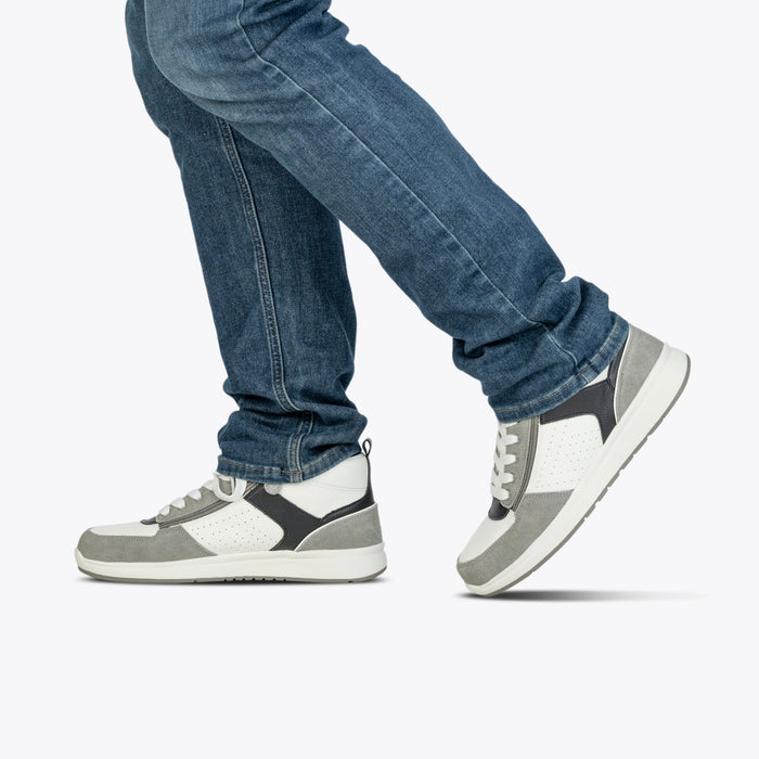 Men's White/Grey/Black BILLY Comfort DZ High modeled with blue jeans on a white background