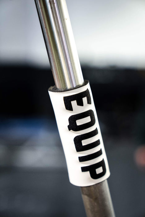 Detail of Equip Products Barbell Markers for Visually Impaired in use on a barbell.