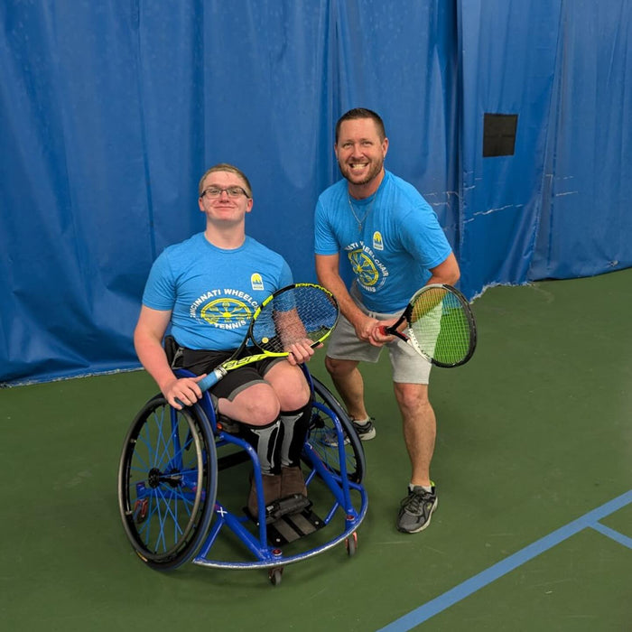 Portrait of Cincinnati Tennis Foundation Championship wheelchair and para-standing competitors with their tennis racquets.