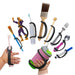 Assorted children's utensils and toys with a black EaZyHold Grip Aid on a white background