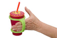 Hand holding a red cup with a lime green EaZyHold Grip Aid on a white background