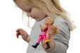 Child holding a small doll Child with an EaZyHold Grip Aid on a white background