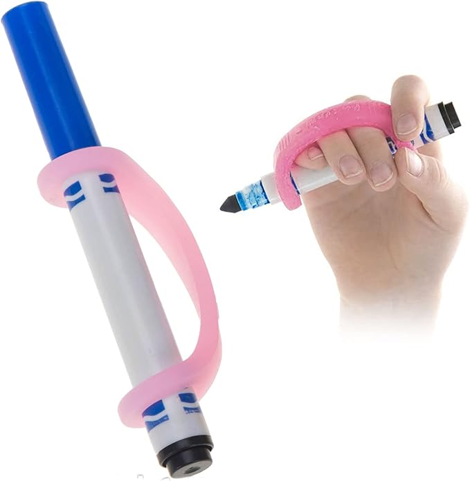 Hand holding a marker with a pink EaZyHold Grip Aid on a white background