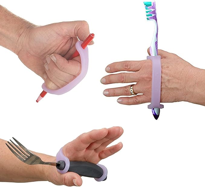 Hands using utensils with a lavender EaZyHold Grid Aid on a white background