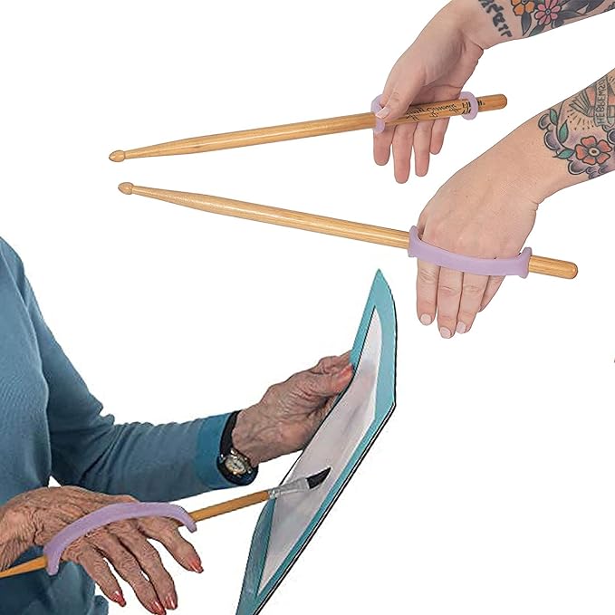 Two pairs of hands holding drumsticks & painting with EaZyHold Grip Aid on a white background