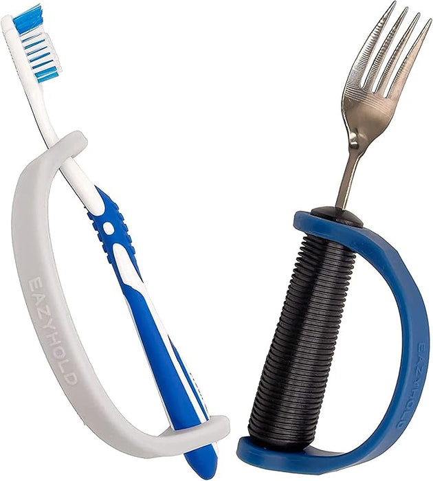 Toothbrush and fork with an EaZyHold Grid Aid on a white background