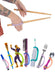 Colorful utensils and tools with an EaZyHold Grid Aid on a white background