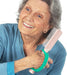 Woman holding a hair comb with a EaZyHold Grip Aid on a white background