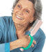 Woman combing her hair with an aqua EaZyHold Grid Aid on a white background