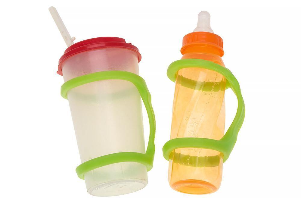 Two colorful sippy cups with lime green EaZyHold Grip Aids on a white background