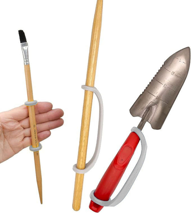 Set of gardening tools including a trowel, pruner, and brush with a platinum EaZyHold Grip Aid on a white background