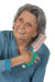 Woman combing her hair with an aqua EaZyHold Grid Aid on a white background