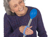 Woman holding a blue and silver spoon with a blue EaZyHold Grid Aid on a white background