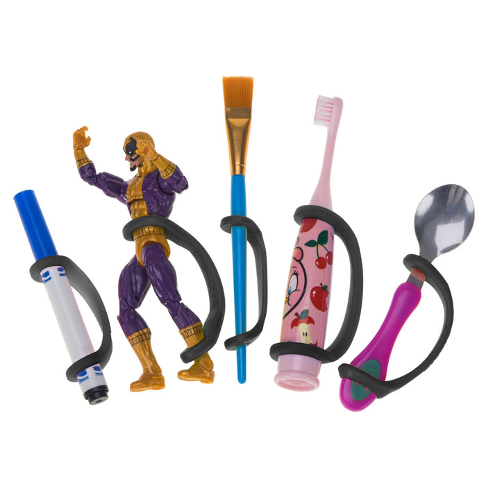Colorful children's utensils and toys including a brush, action figure, toothbrush, spoon, and marker with a black EaZyHold Grip Aid holding each item on a white background 