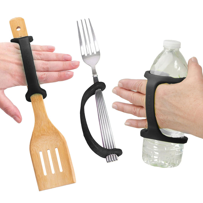 Hands holding a spatula, fork, and water bottle with a black EaZyHold Grid Aid on a white background