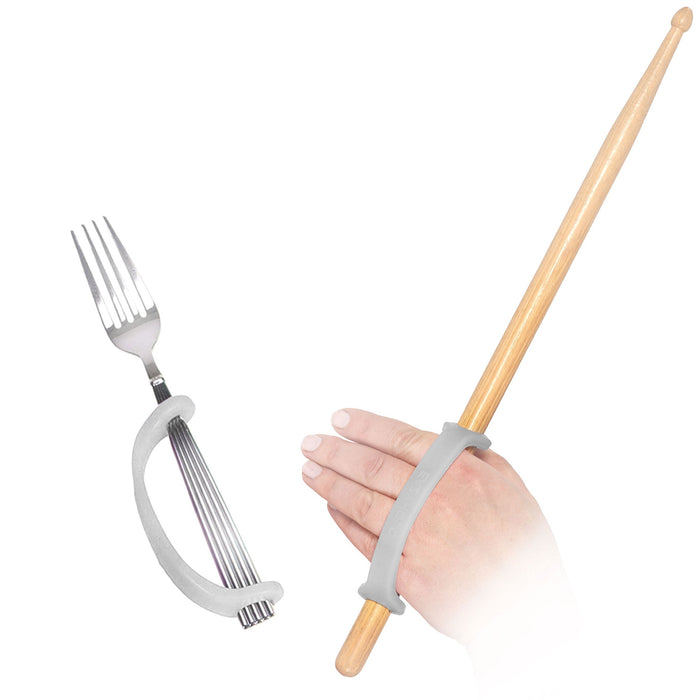 Hand holding a drum stick and a fork with a black EaZyHold Grid Aid on a white background