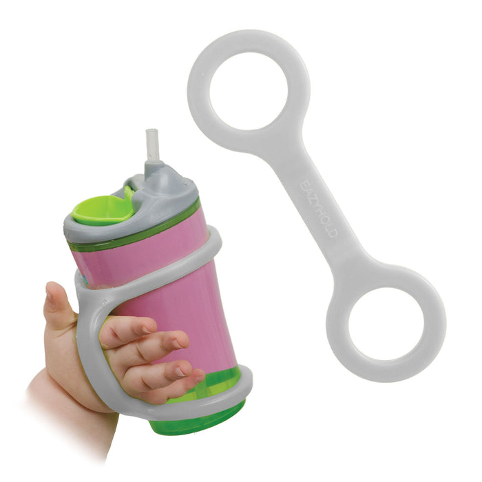 Sippy cup held with a platinum EaZyHold Grip Aid on a white background