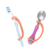 Set of toothbrush and spoon held with an orange EaZyHold Grip Aid on a white background