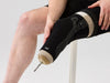 Detail of a user putting on the Ethnocare Overlay