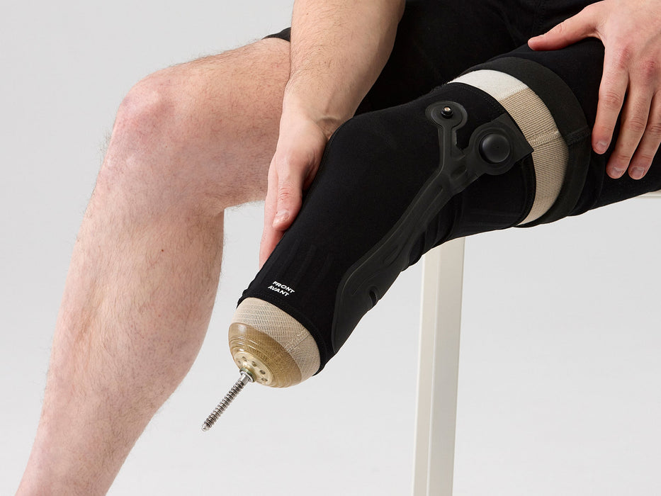 Detail of a user putting on the Ethnocare Overlay