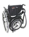FreeWheel Wheelchair Attachment Black on the back of a wheelchair on a white background.
