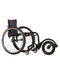 FreeWheel Wheelchair Attachment Black on a wheelchair on a white background.