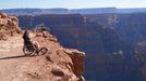 FreeWheel Wheelchair Attachment user at the edge of the Grand Canyon.