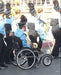 FreeWheel Wheelchair Attachment user in a marching band.