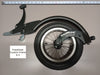 FreeWheel Wheelchair Attachment Black Size 6.5" against a tape measure.