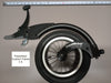 FreeWheel Wheelchair Attachment Black Size 7.5" against a tape measure.