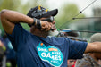 Athlete ready to release a bow in the archery competition at the Great Lakes Games.