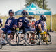 Chicago Bears Wheelchair Football team getting ready to run a play.