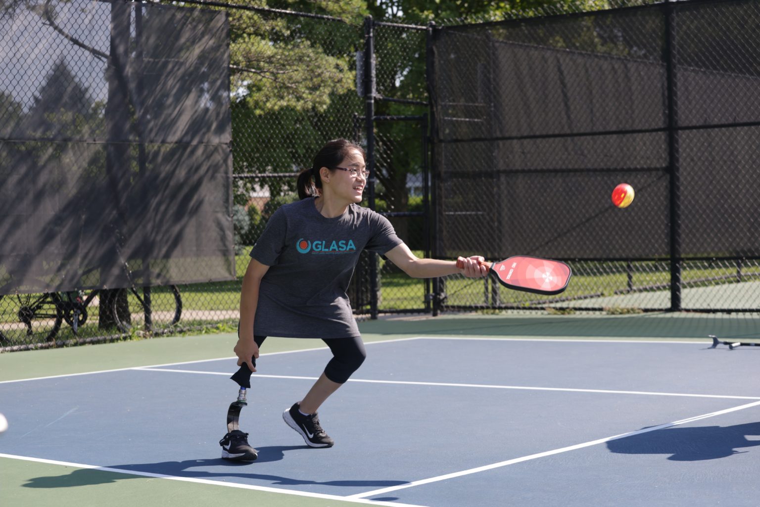 GLASA athlete getting ready to return a pickleball.